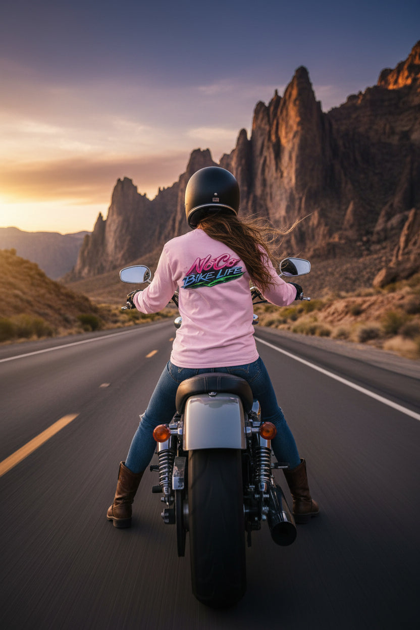 Pink Long Sleeve Tee  with 'NoCo BikeLife' text on a pink background