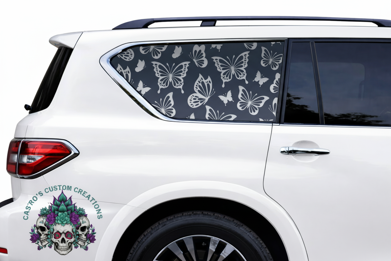 White car with a full coverage window decal featuring butterflies patterns.