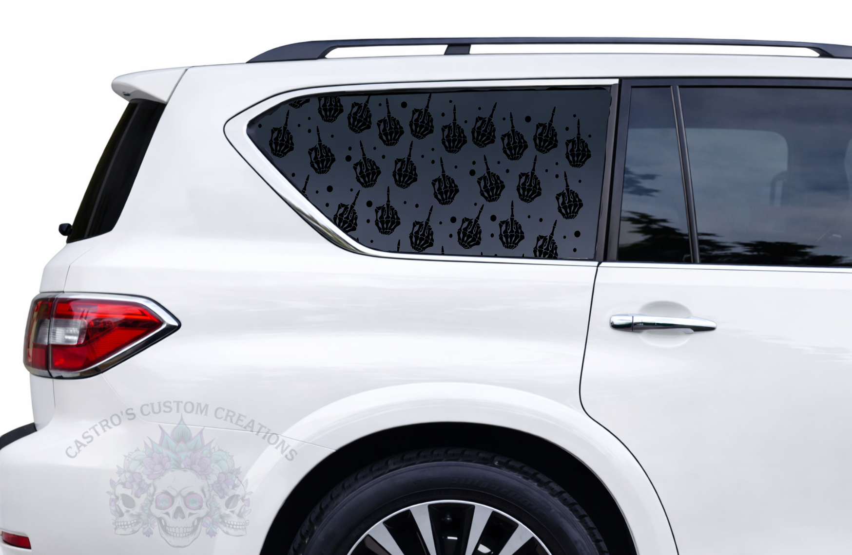 White SUV with matte black skeleton middle finger full coverage window decal on rear window